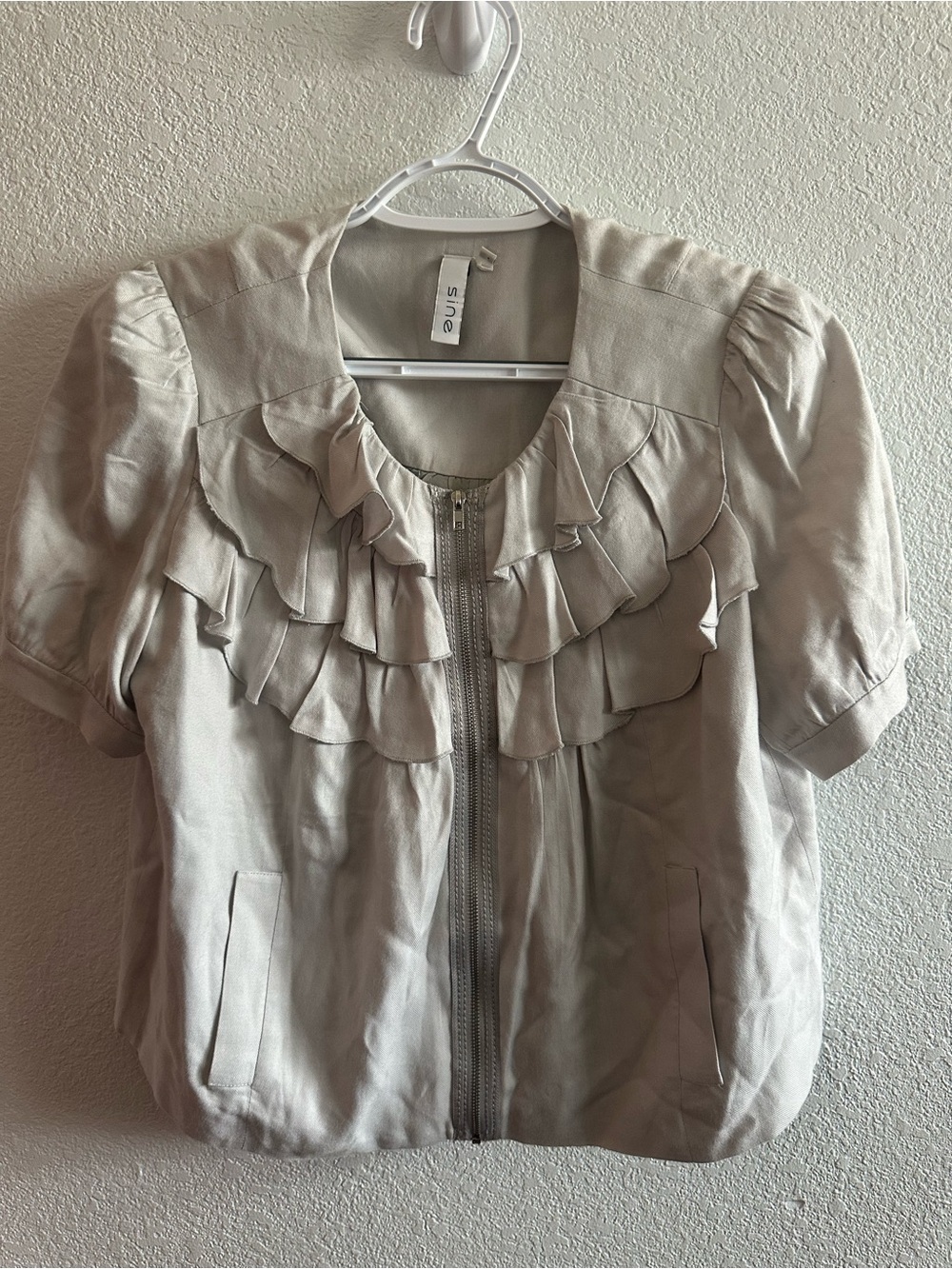 Ruffle zip up blouse